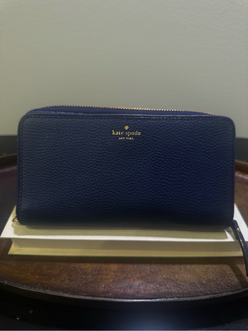 kate spade navy pebbled leather zip wallet with gold logo